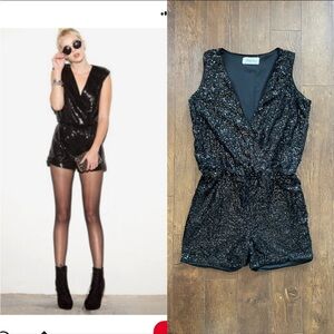 Black Sequin Surplice V-Neck Romper. Stretchy. Medium.